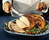 Chef Cutting Turkey Breast