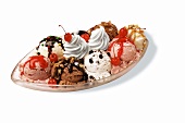 Ice bowl with 8 scoops of ice cream, candied cherries & cream