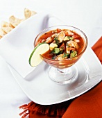 Shrimp cocktail with avocado and limes