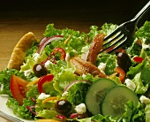 A Greek Salad with Anchovies; Close Up