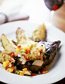 Beefsteak with onion and pepper relish and fried potatoes