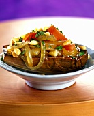 Aubergine with caramelised onions and pine nuts (USA)