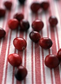 Cranberries on striped cloth
