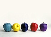 Five painted apples in a row