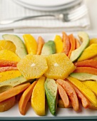 A Fruit Platter with Mango, Papaya, Orange and Avocado