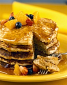 Pancakes with maple syrup and fruit