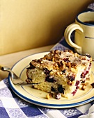Piece of blueberry cake with walnuts