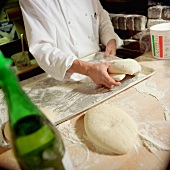 Chef Working with Dough Rounds