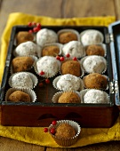 White and Brown Truffles in a Wooden Box