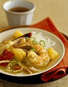Sweet and sour king prawns with pineapple and peppers