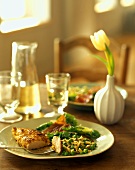 Chicken breast with almond crust with peas, pasta & salad
