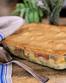 Chicken casserole with pastry crust in the baking dish