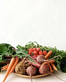 Various types of root vegetables on wicker plate
