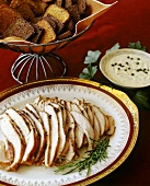 Sliced Turkey on a Platter with Toast and Remoulade