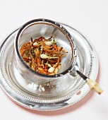 Wet Tea Leaves in a Tea Strainer
