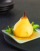 A Poached Pear with Orange Zest and Mint