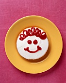 Amerikaner biscuit with glace icing and face