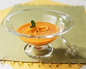 Cream of carrot soup in a glass bowl