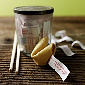 Fortune cookie, storage jar and chopsticks