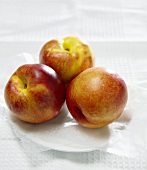 Three Nectarines