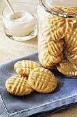 Sugar Cookies on a Napkin and in a Glass Cookie Jar