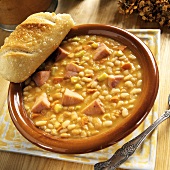 White bean soup with carrots, celery and ham