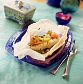 Halibut Steak Steamed in Parchment with Tomatoes, Lemon and Herbs