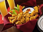 Popcorn Chicken with Dipping Sauce and Beer