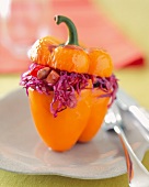 An Orange Bell Pepper Stuffed with Red Cabbage