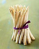 Bundle of White Asparagus Tied with a Purple Cloth Ribbon