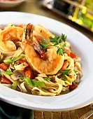 Shrimp with pasta on plate