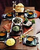 Laid table with Indian dishes