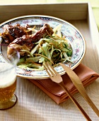 Grilled chicken pieces with cabbage salad