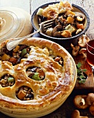 Vegetable Barley Pot Pie in Baking Dish with a Serving in a Bowl