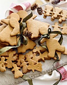 Various Sized Gingerbread Men and Women Cookies; Some Tied with Ribbon