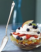 Layered dessert of fresh fruit and yoghurt cream