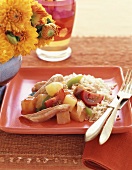 Sweet and sour chicken with pineapple, vegetables and rice