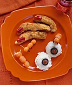 Halloween dishes: chicken sticks, mashed potato & carrots