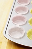 Muffin Pan Lined with Paper Muffin Cups