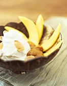 Mango Slices with Ice Cream Dulce Deleche and Almonds