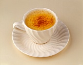 Cup of Eggnog on a Saucer