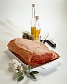 Rib Eye Roast on Tray with Oils and Knifes