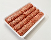 Raw Pork Sausage Links in White Tray