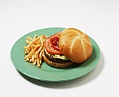 Hamburger with Lettuce, Tomato and Ketchup; French Fries on the Side
