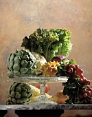 Still Life: Assorted Vegetables on a Cake Stand with a Kiwano