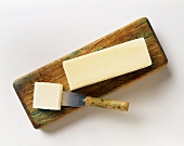 Stick of Butter with a Piece Cut Off