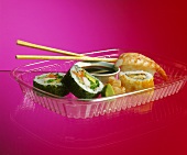 Assorted Sushi with Sauce and Chopsticks; To-Go