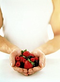 Hands Holding Berries