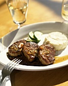 Lamb medallions with lime relish and goat's cheese