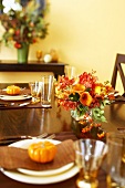Table Set with Gourds and Autumn Floral Centerpiece